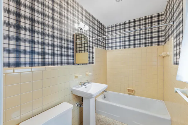 a bathroom with a sink and a bathtub