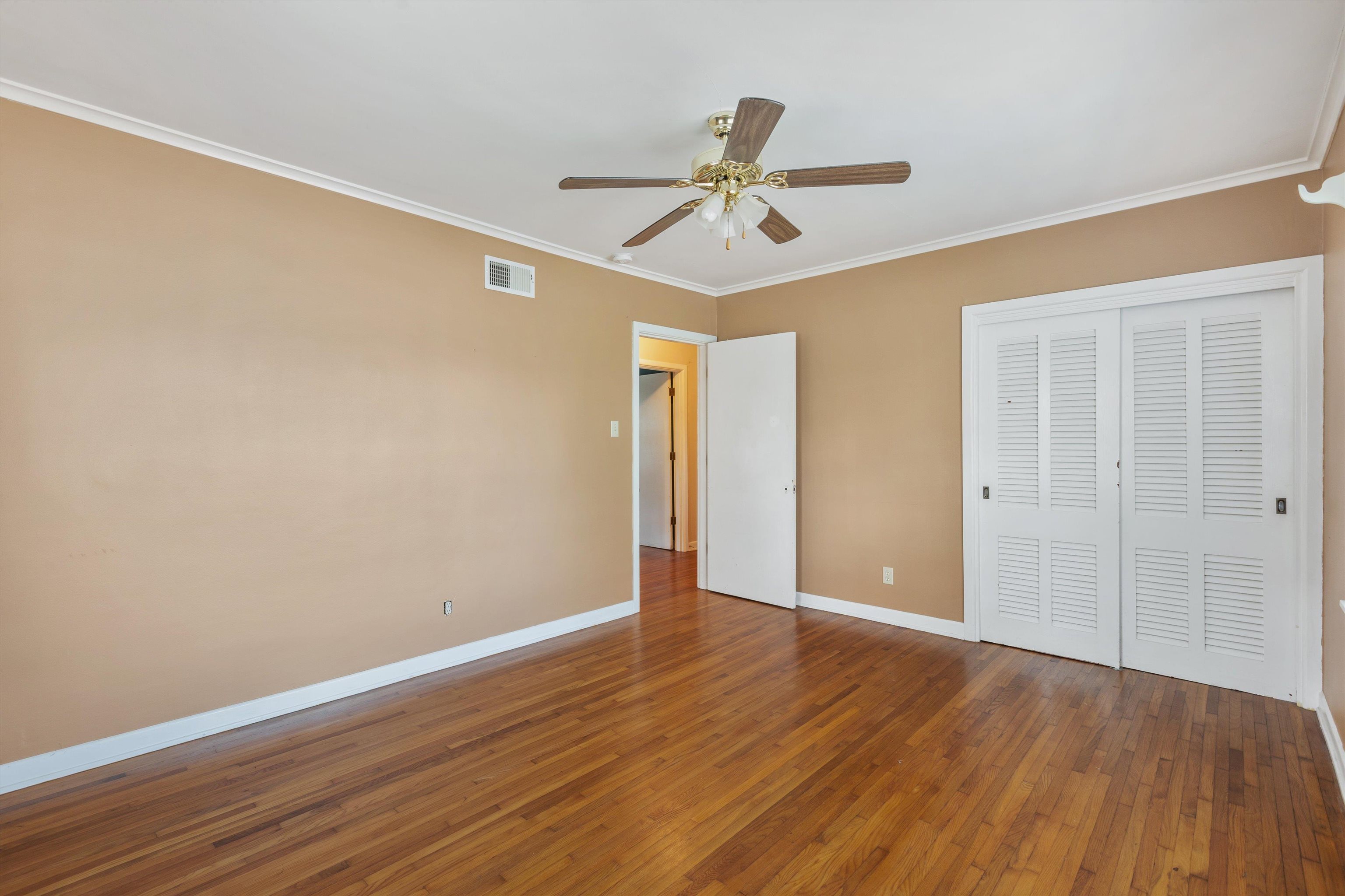 131 North Mendenhall Road Memphis, TN 38117 - Photo 21 of 26 a view of an empty room with wooden floor
