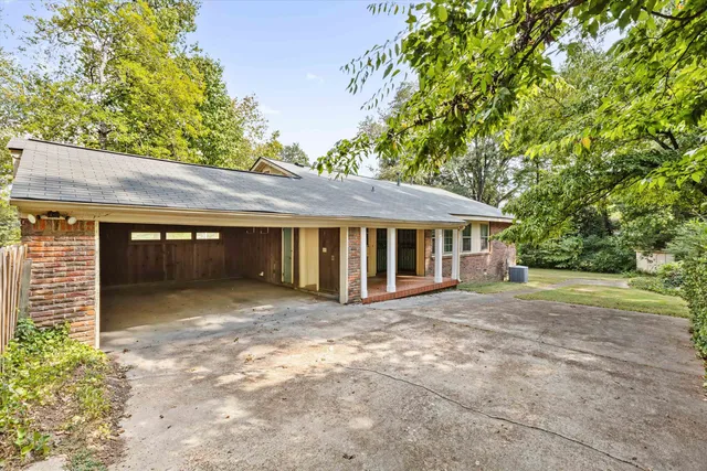 a front view of a house with yard