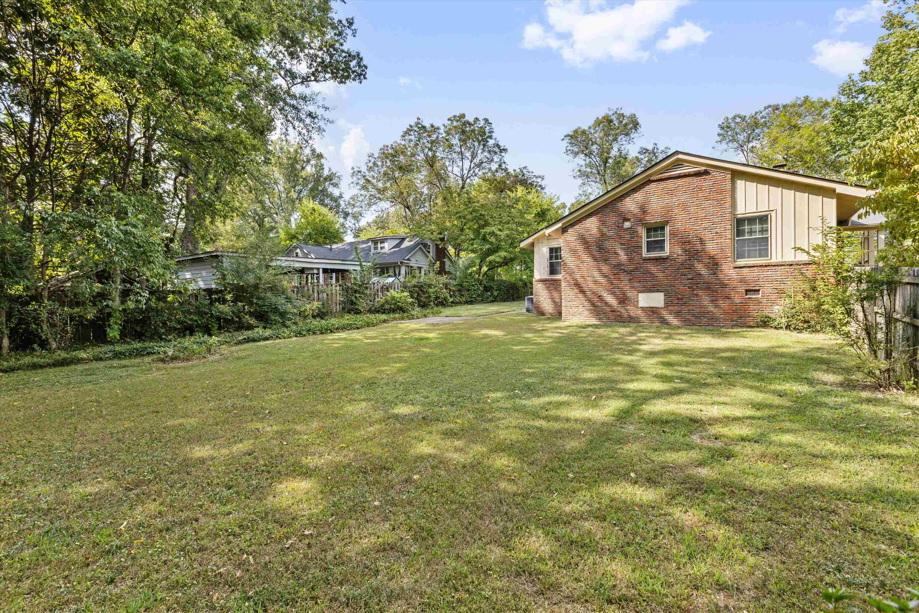 131 North Mendenhall Road Memphis, TN 38117 - Photo 26 of 26 a view of a house with a yard