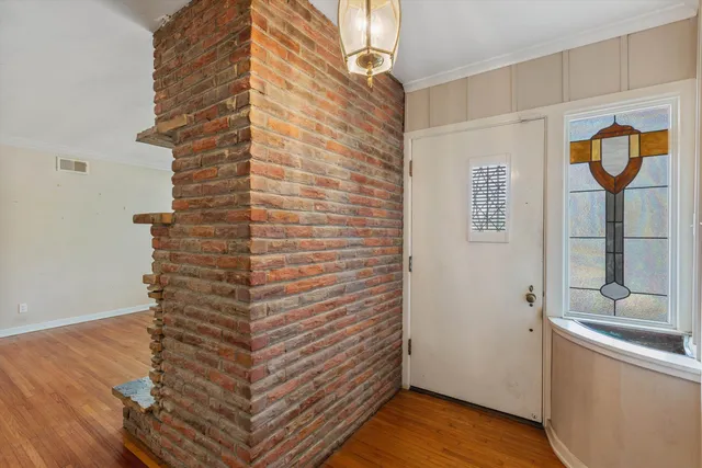 a view of a bathroom with a shower and a sink