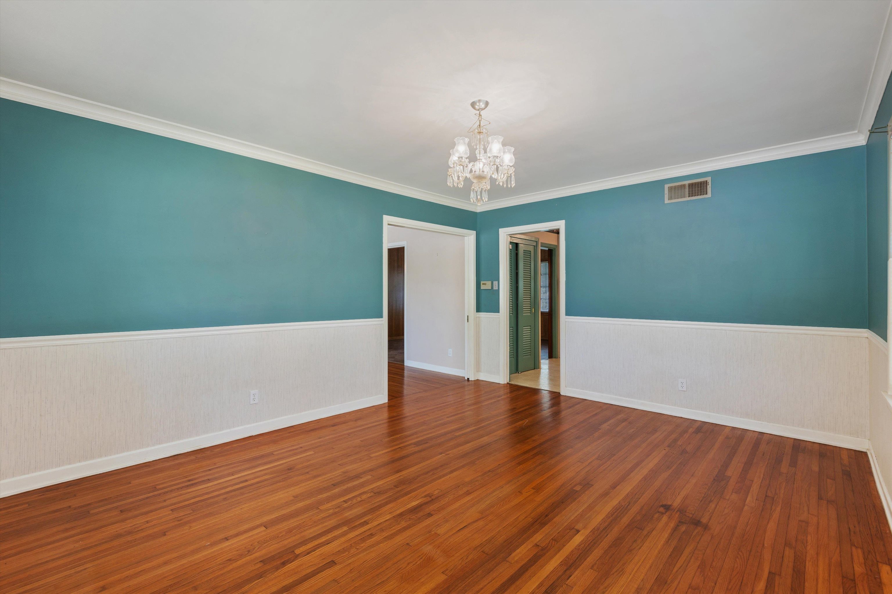 131 North Mendenhall Road Memphis, TN 38117 - Photo 10 of 26 a view of an empty room with wooden floor