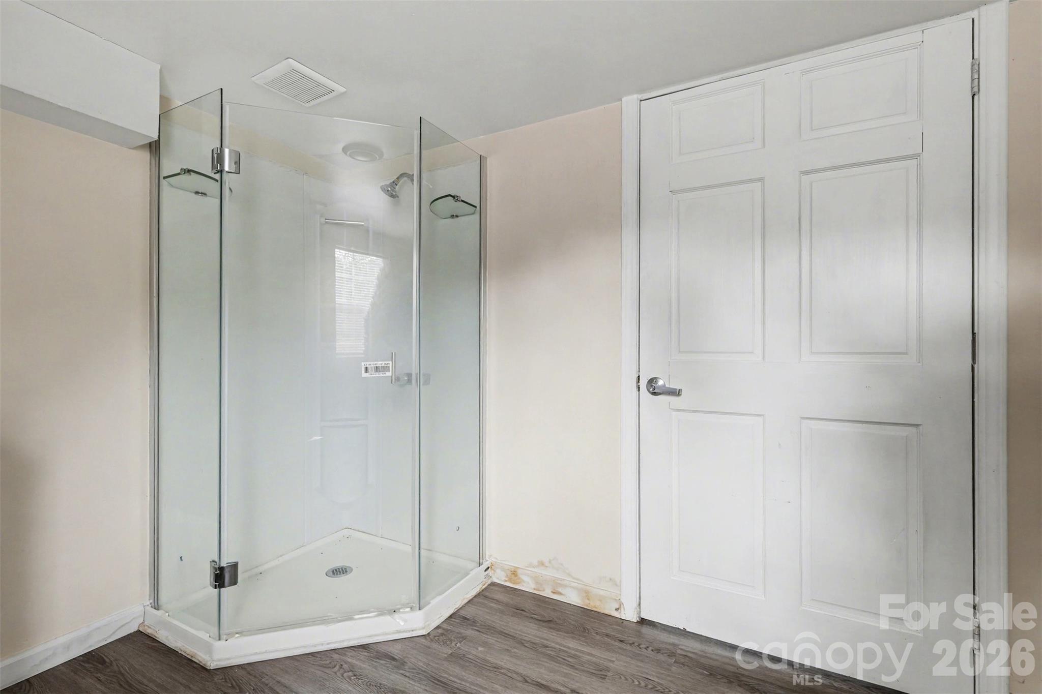 596 Armory Road Chester, SC 29706 - Photo 14 of 25 a bathroom with a glass shower door