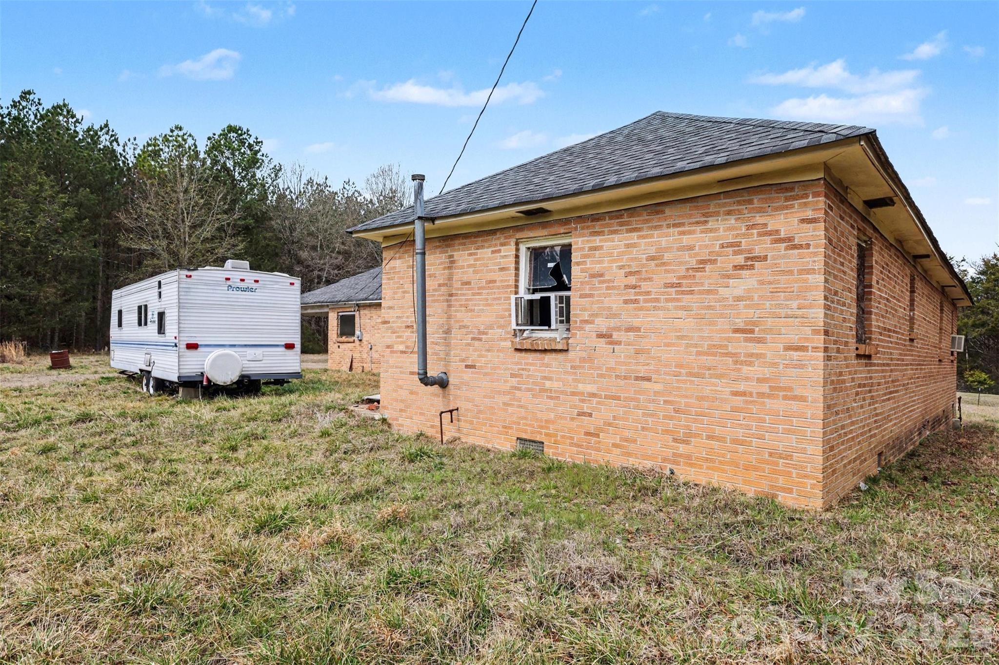 596 Armory Road Chester, SC 29706 - Photo 5 of 25 a backyard of a house