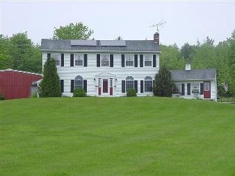 223 East Windsor Road Peru, MA 01235 - Photo 1 of 2 a front view of house with yard and green space