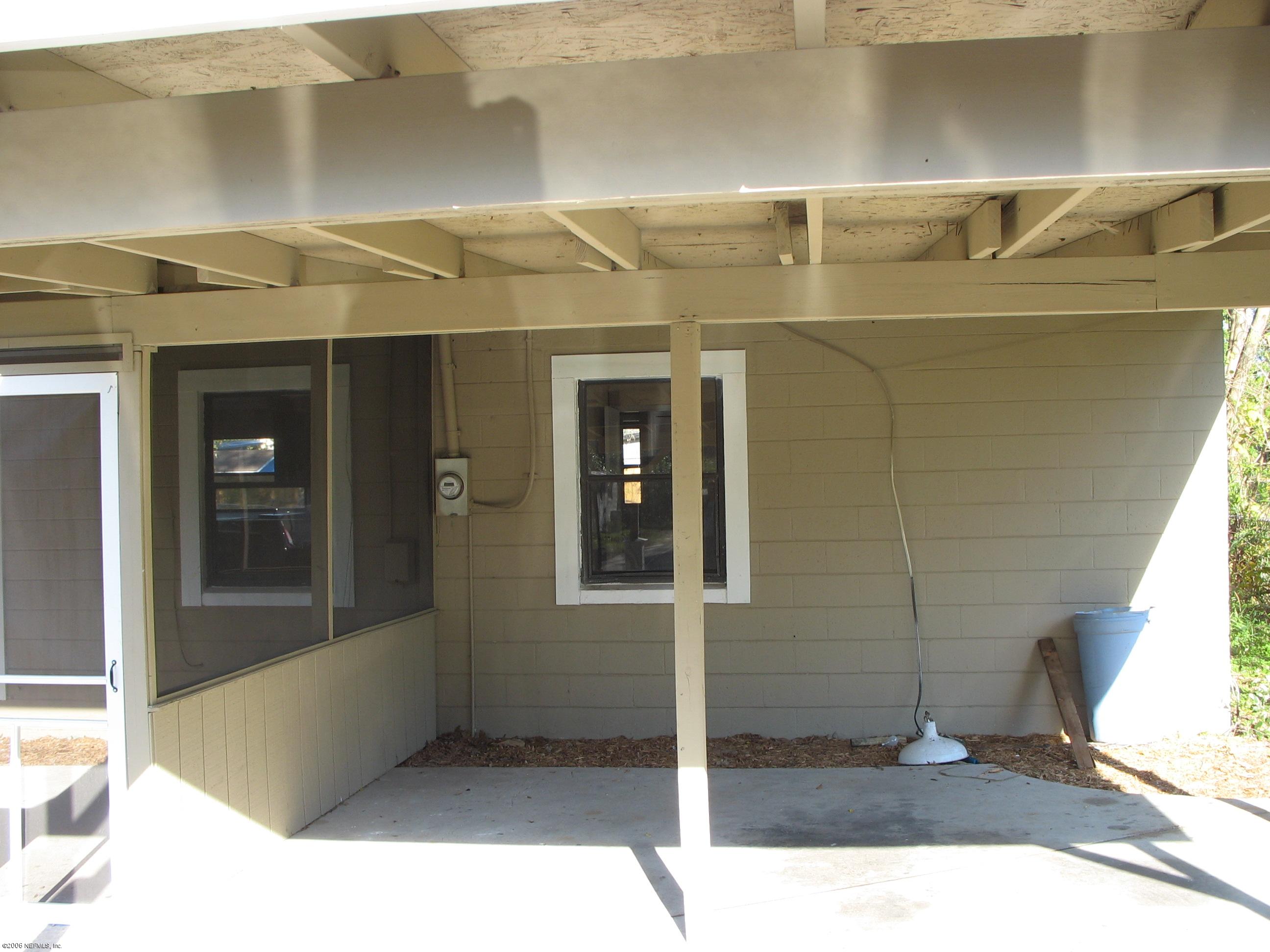 1449 Griflet Road Jacksonville, FL 32211 - Photo 8 of 8 a view of an entrance of the house
