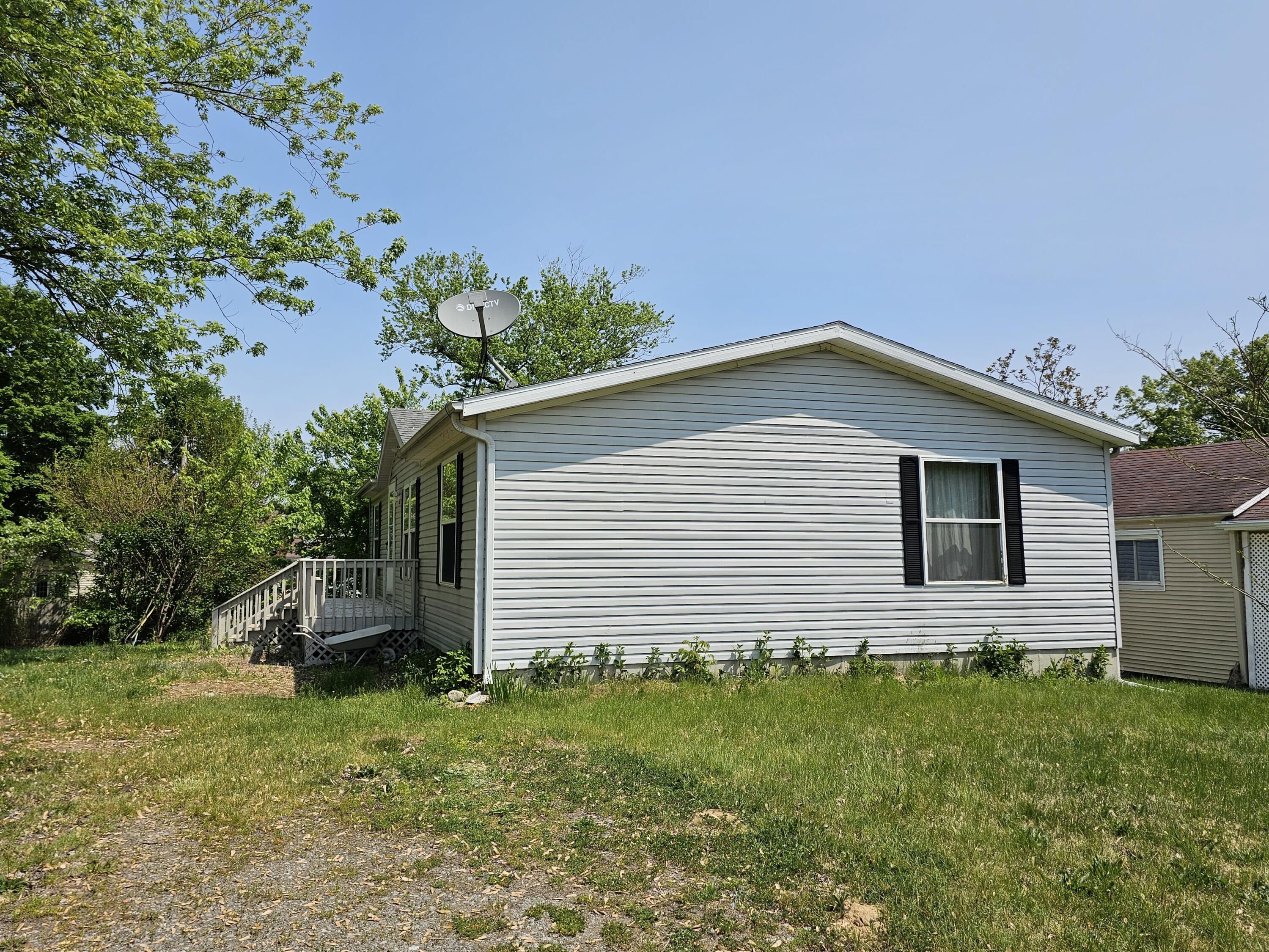 722 Roe Street Buchanan, MI 49107 - Photo 17 of 18 street side