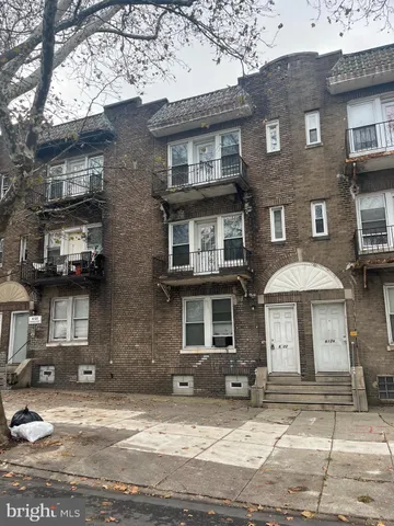 a front view of a house with yard