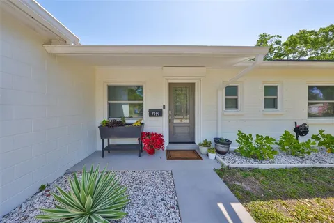 a house view with a garden space
