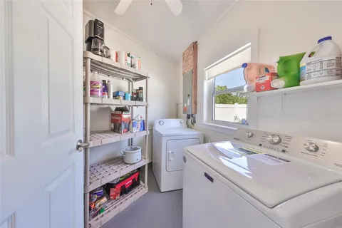 a storage room with washer and dryer