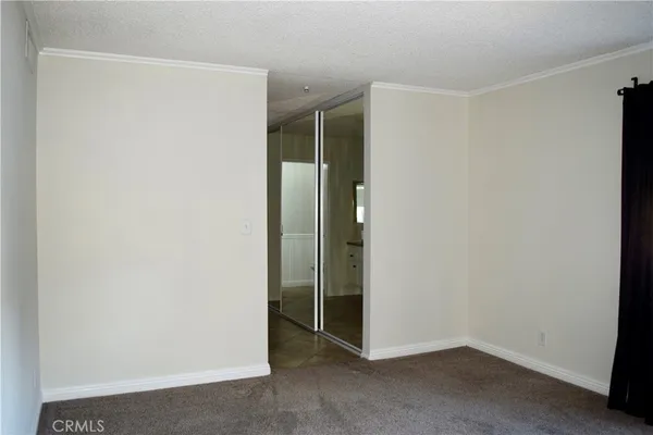 an empty room with closet