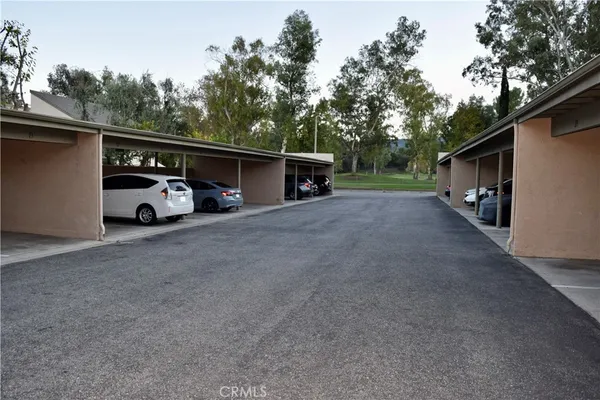 a view of a house with pool table and chairs