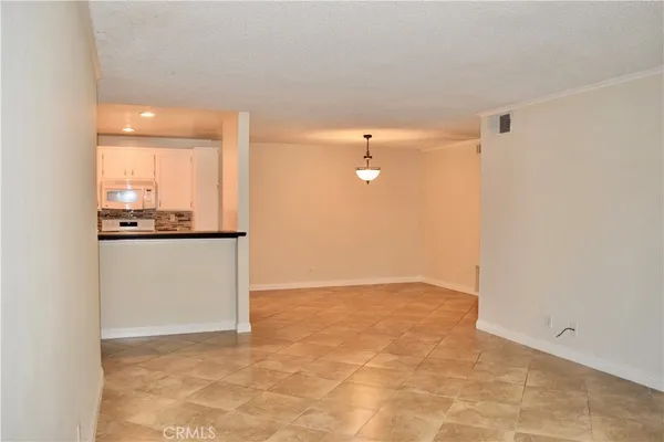 a view of a kitchen with a sink