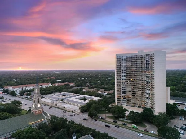 a view of a city with tall buildings