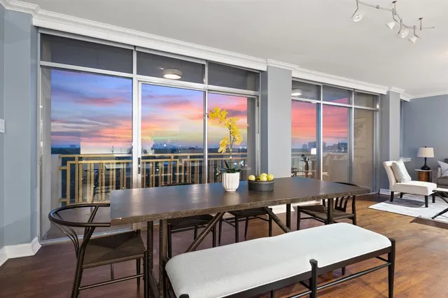 a view of a dining room with furniture window and outside view