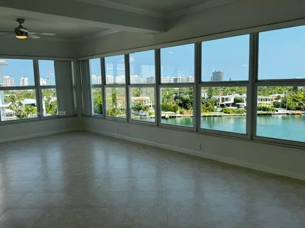 a white toilet sitting next to a bath tub