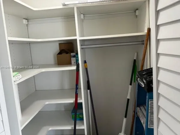 a view of a swimming pool and a yard