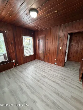 an empty room with windows