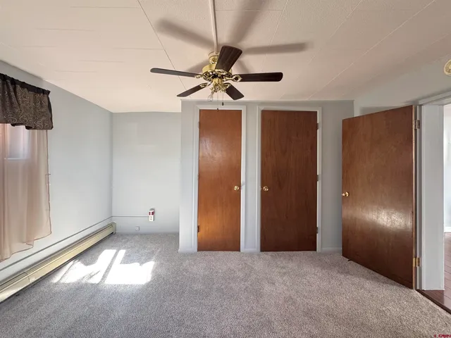 a view of empty room with windows