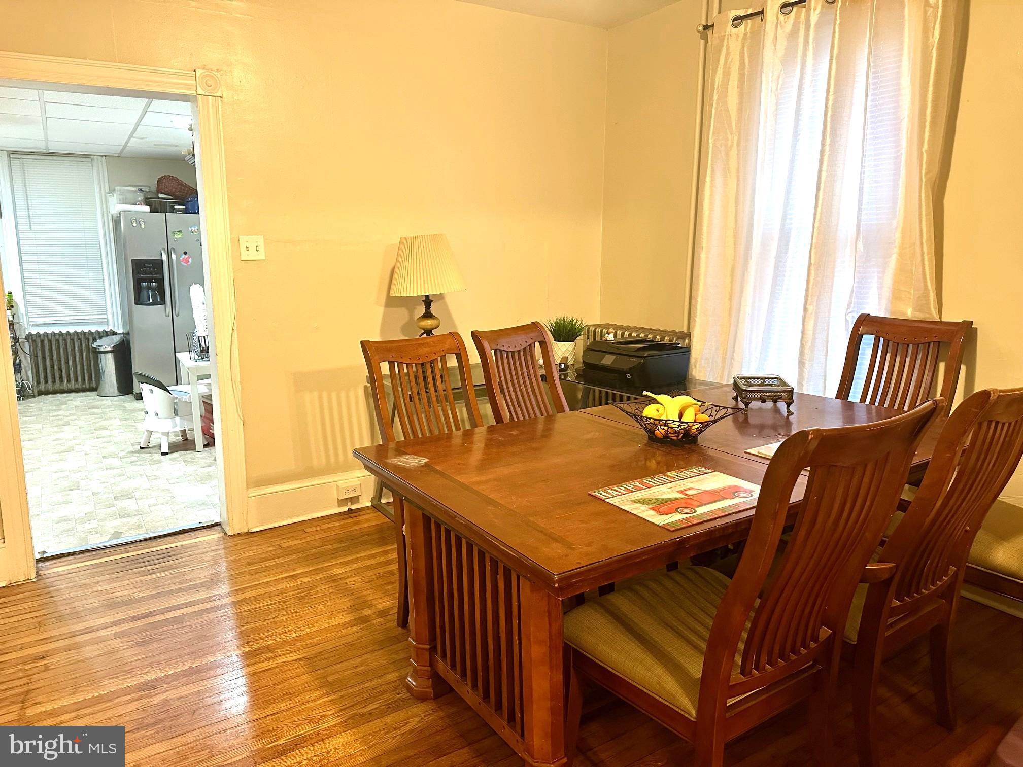 3411 Penn Avenue Sinking Spring, PA 19608 - Photo 5 of 13 a view of a dining room with furniture and wooden floor