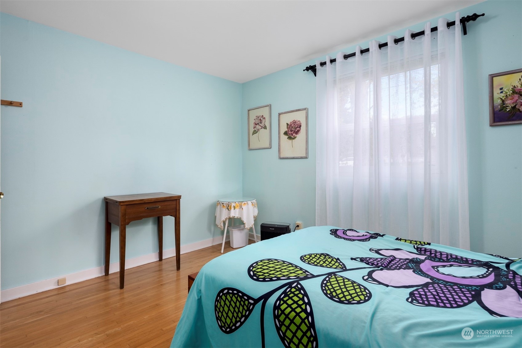 2931 McLeod Road Bellingham, WA 98225 - Photo 12 of 37 a bedroom with a bed and a table in it