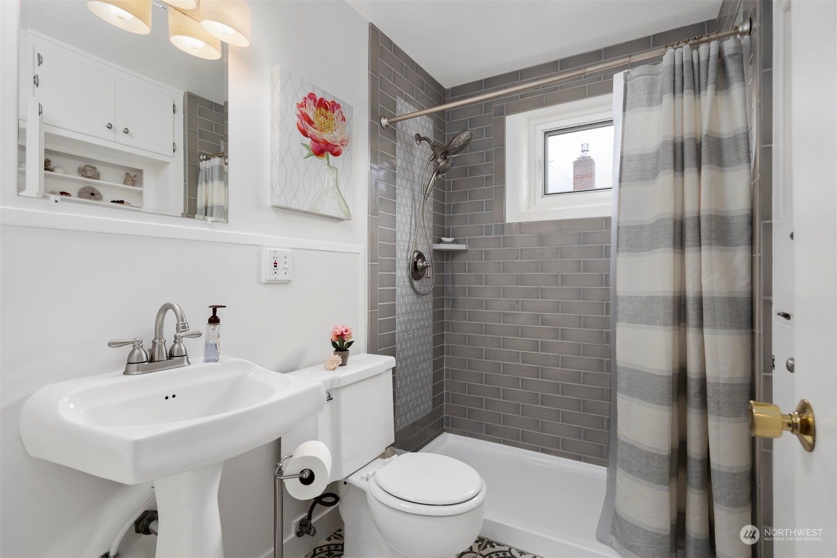 2931 McLeod Road Bellingham, WA 98225 - Photo 13 of 37 a bathroom with a sink a toilet and shower