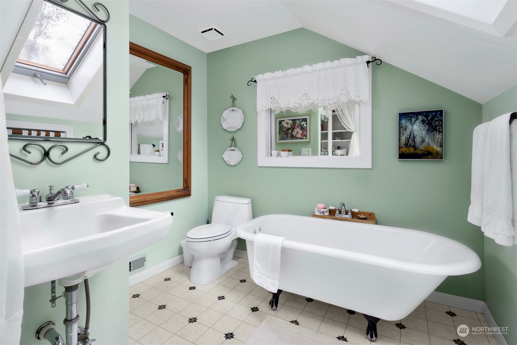2931 McLeod Road Bellingham, WA 98225 - Photo 14 of 37 a bathroom with a sink mirror and toilet