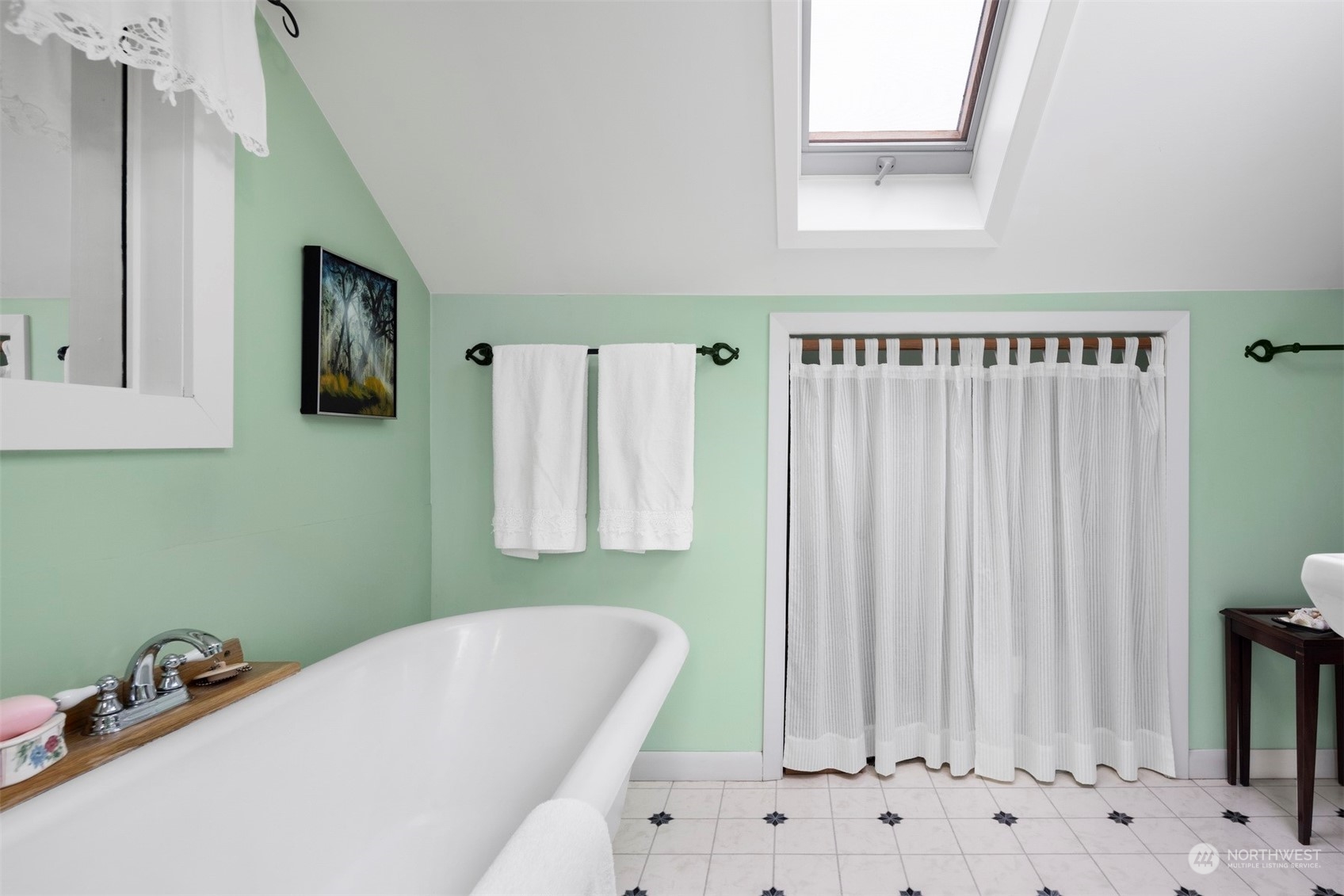 2931 McLeod Road Bellingham, WA 98225 - Photo 18 of 37 a bathroom with a bathtub and a window