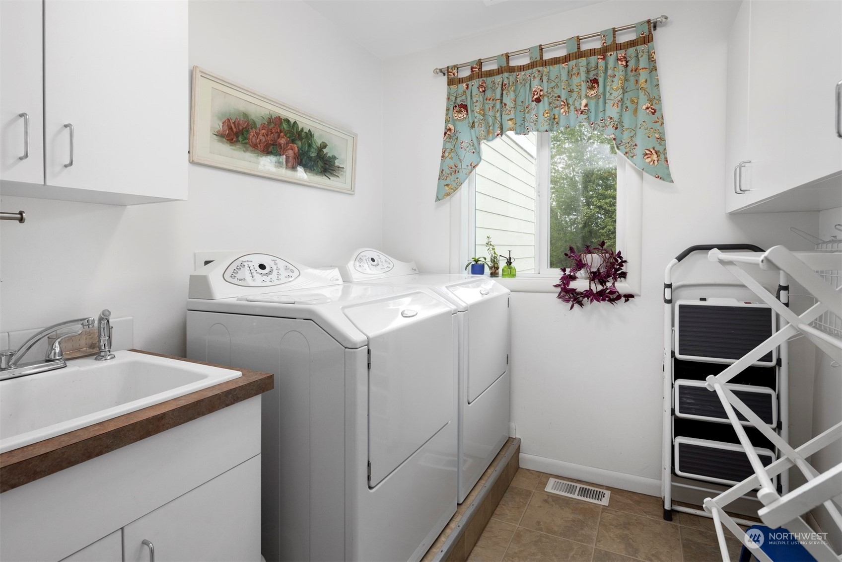 2931 McLeod Road Bellingham, WA 98225 - Photo 20 of 37 a utility room with a sink dryer and washer