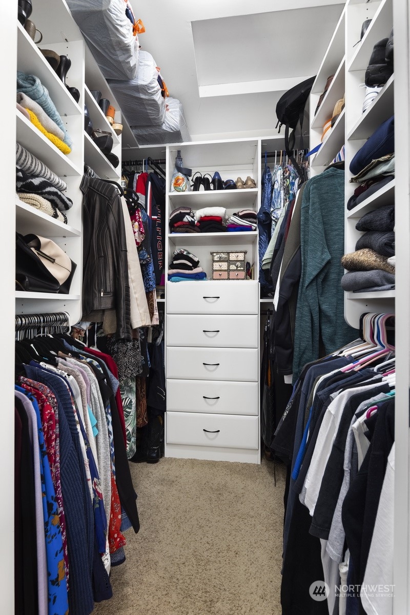 2931 McLeod Road Bellingham, WA 98225 - Photo 25 of 37 a view of walk in closet with clothes and shoes