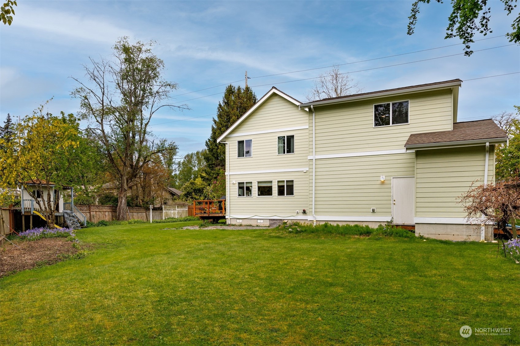 2931 McLeod Road Bellingham, WA 98225 - Photo 35 of 37 a view of a house with a yard
