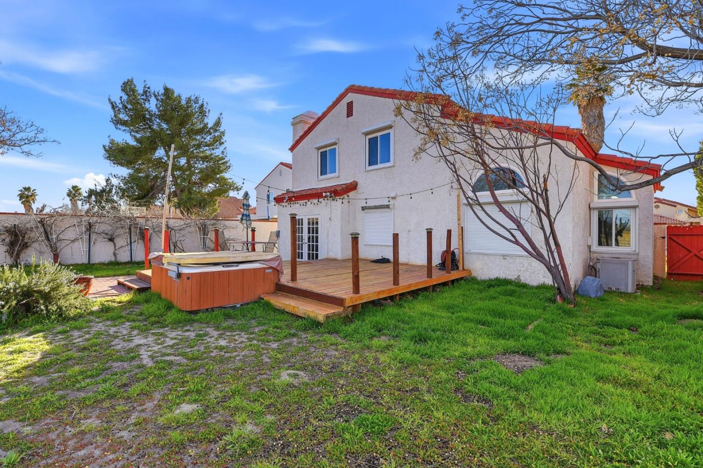 44648 17th Street East Lancaster, CA 93535 - Photo 20 of 21 a front view of a house with yard and a garden