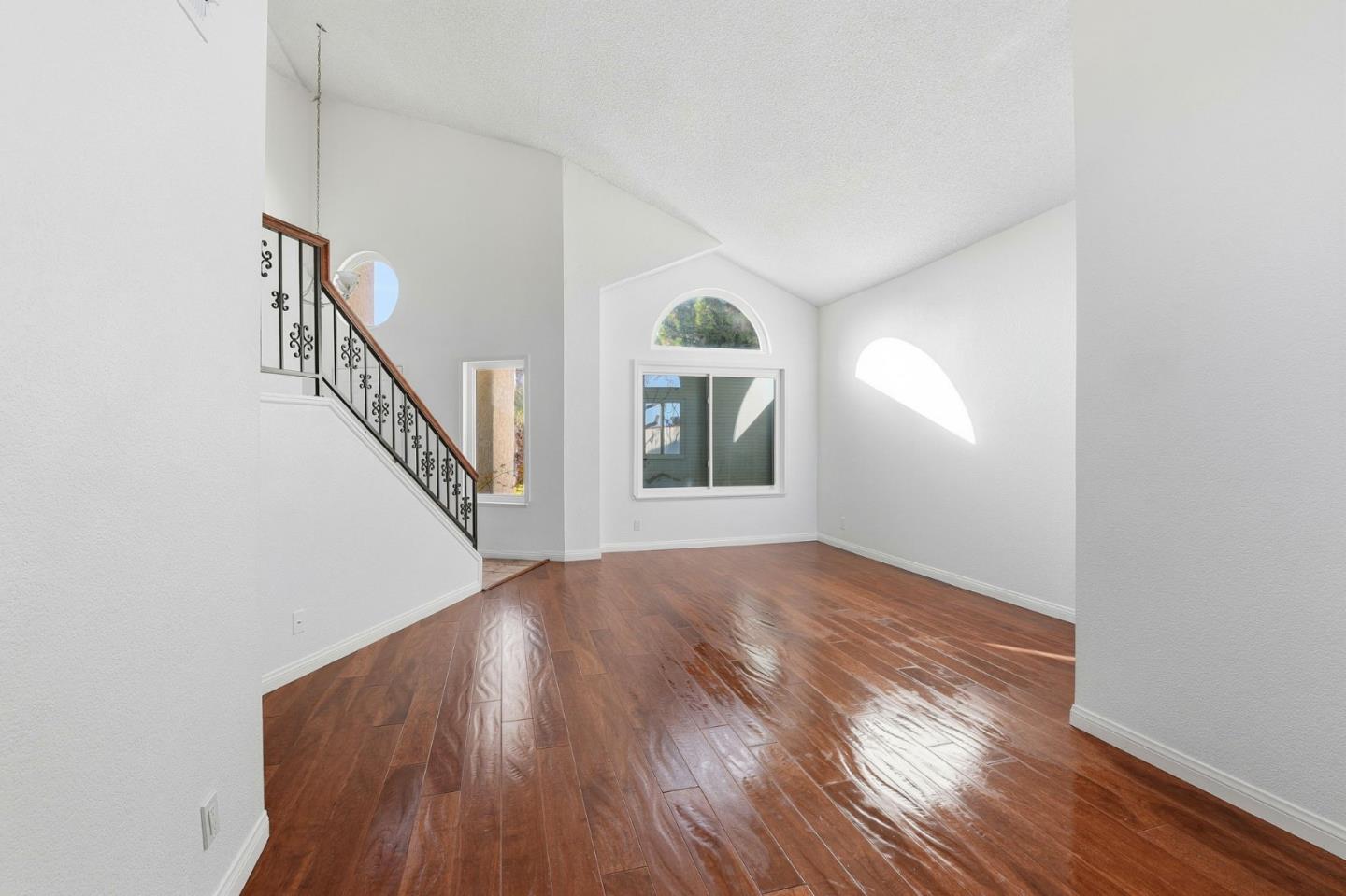 44648 17th Street East Lancaster, CA 93535 - Photo 3 of 21 a view of empty room with wooden floor and fan