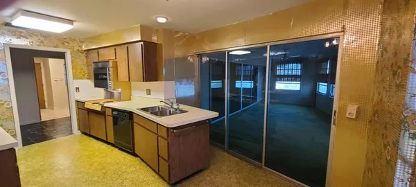 a bathroom with a sink and a bathtub