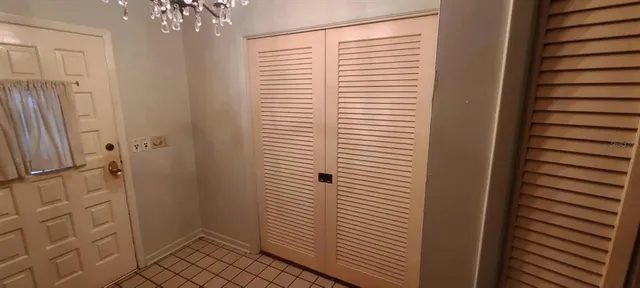 a view of hallway with closet