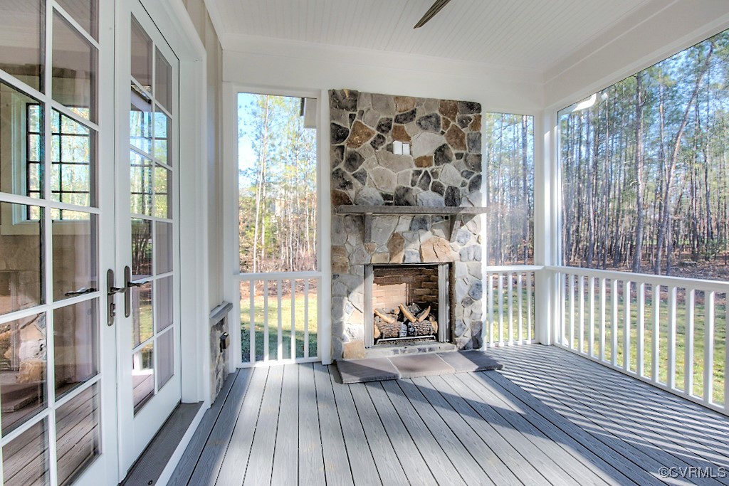 3530 Old Gun Road West Midlothian, VA 23113 - Photo 22 of 37 a view of a room with wooden floor fireplace and windows
