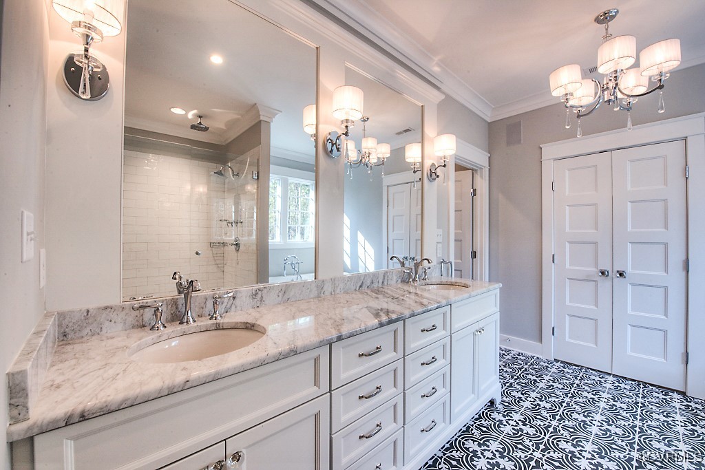 3530 Old Gun Road West Midlothian, VA 23113 - Photo 29 of 37 a bathroom with a granite countertop sink a large mirror a and a shower