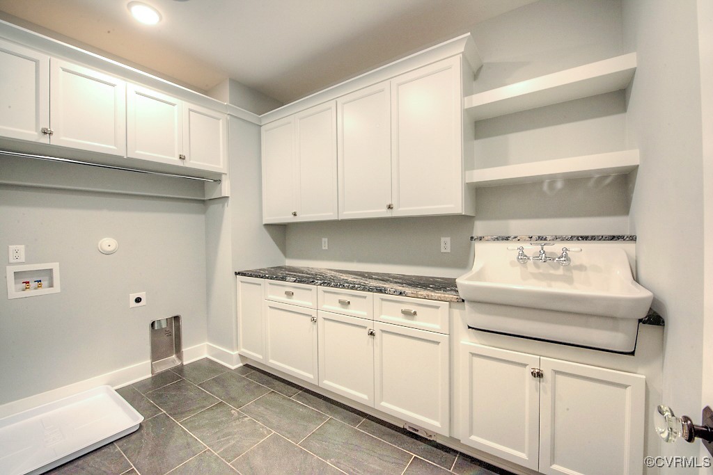 3530 Old Gun Road West Midlothian, VA 23113 - Photo 32 of 37 a kitchen with granite countertop white cabinets and white appliances