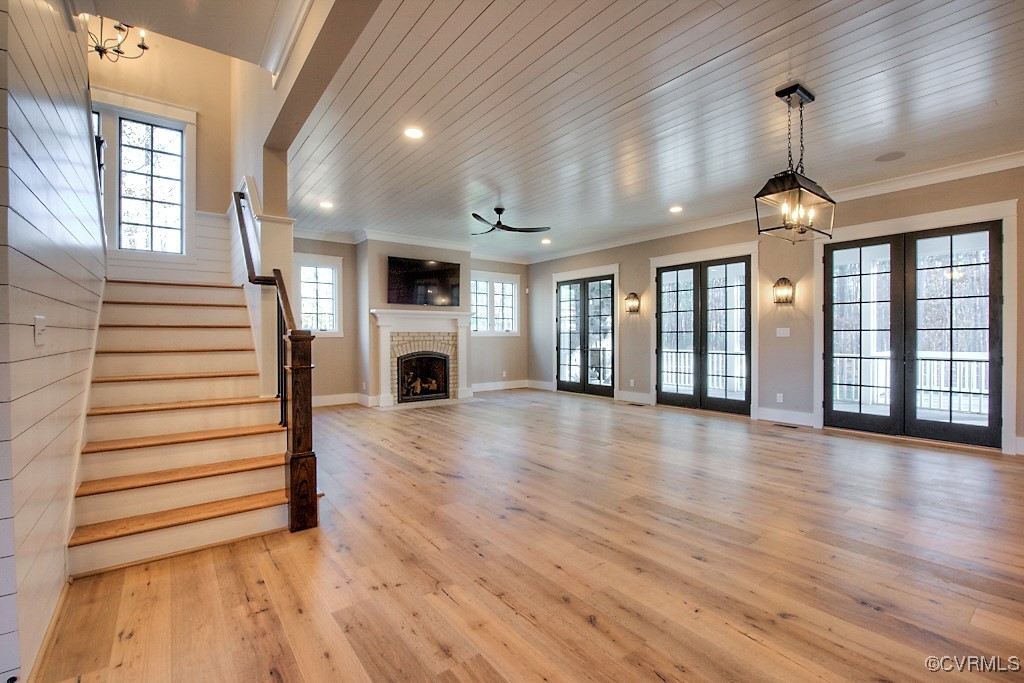 3530 Old Gun Road West Midlothian, VA 23113 - Photo 7 of 37 a view of a livingroom with wooden floor fireplace and windows