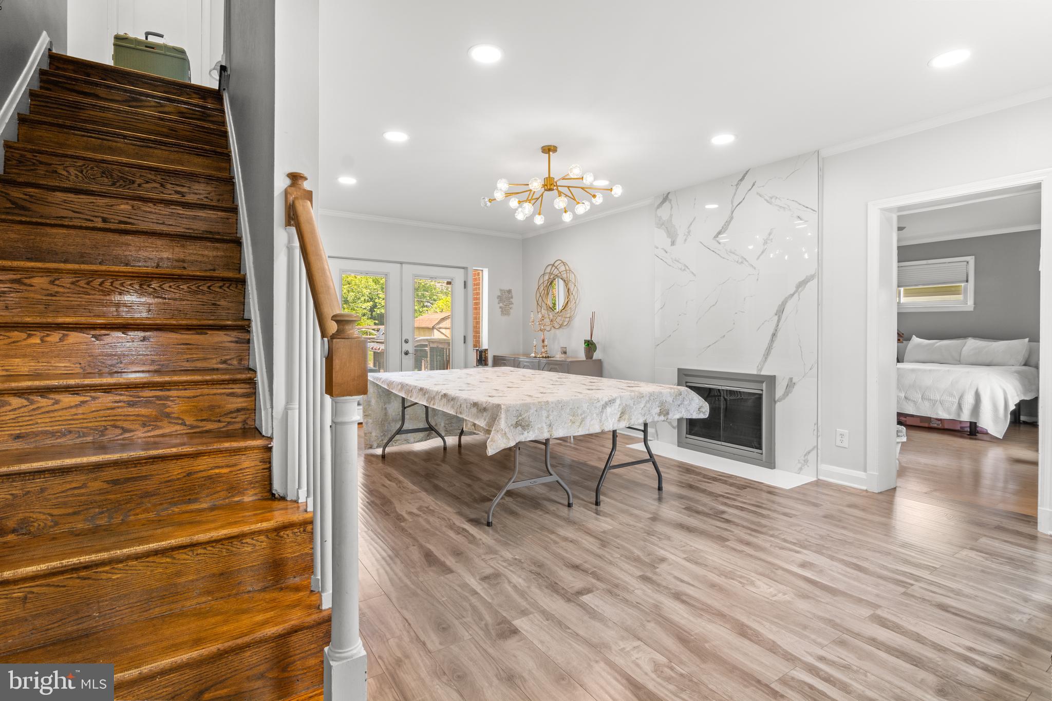 3302 Northbrook Road Baltimore, MD 21208 - Photo 11 of 35 a view of a livingroom with furniture and wooden floor
