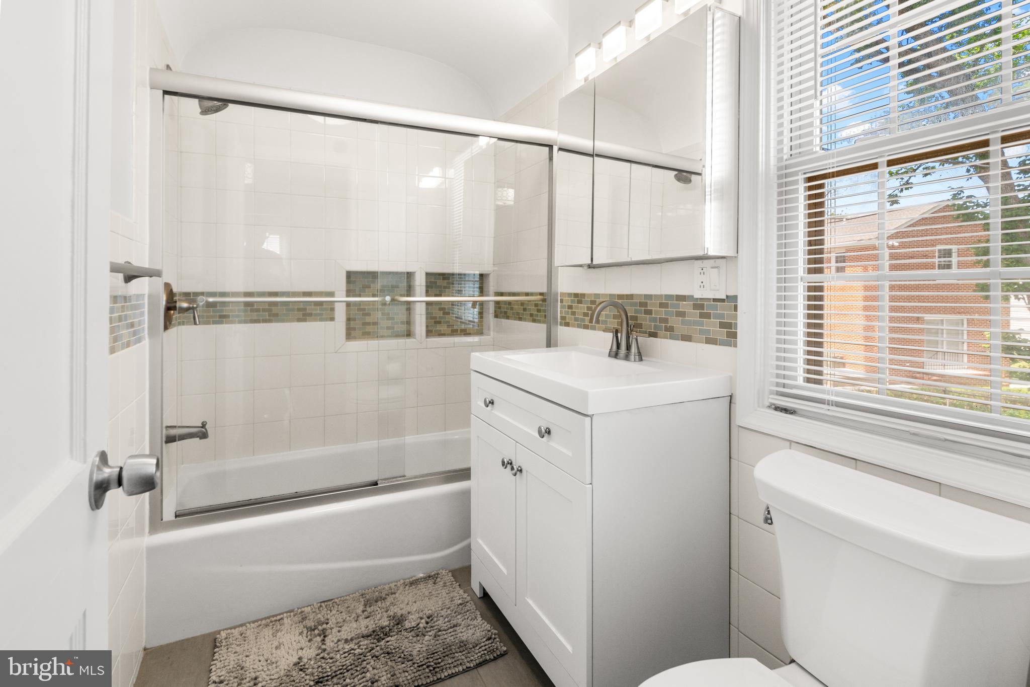 3302 Northbrook Road Baltimore, MD 21208 - Photo 20 of 35 a bathroom with a sink toilet and shower