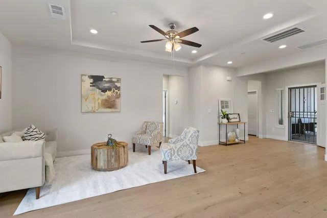 a living room with furniture and window