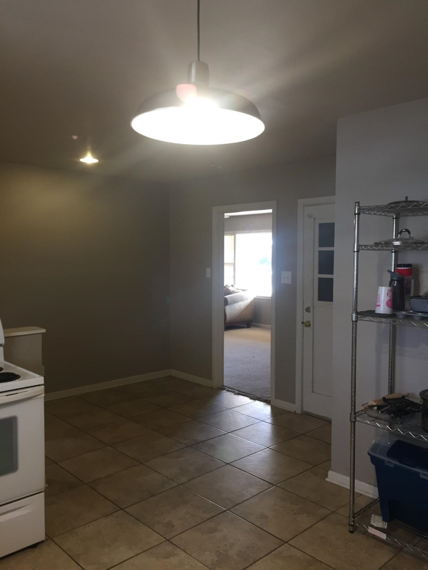 3216 36th Street Lubbock, TX 79413 - Photo 4 of 11 a view of a kitchen cabinets and a stove