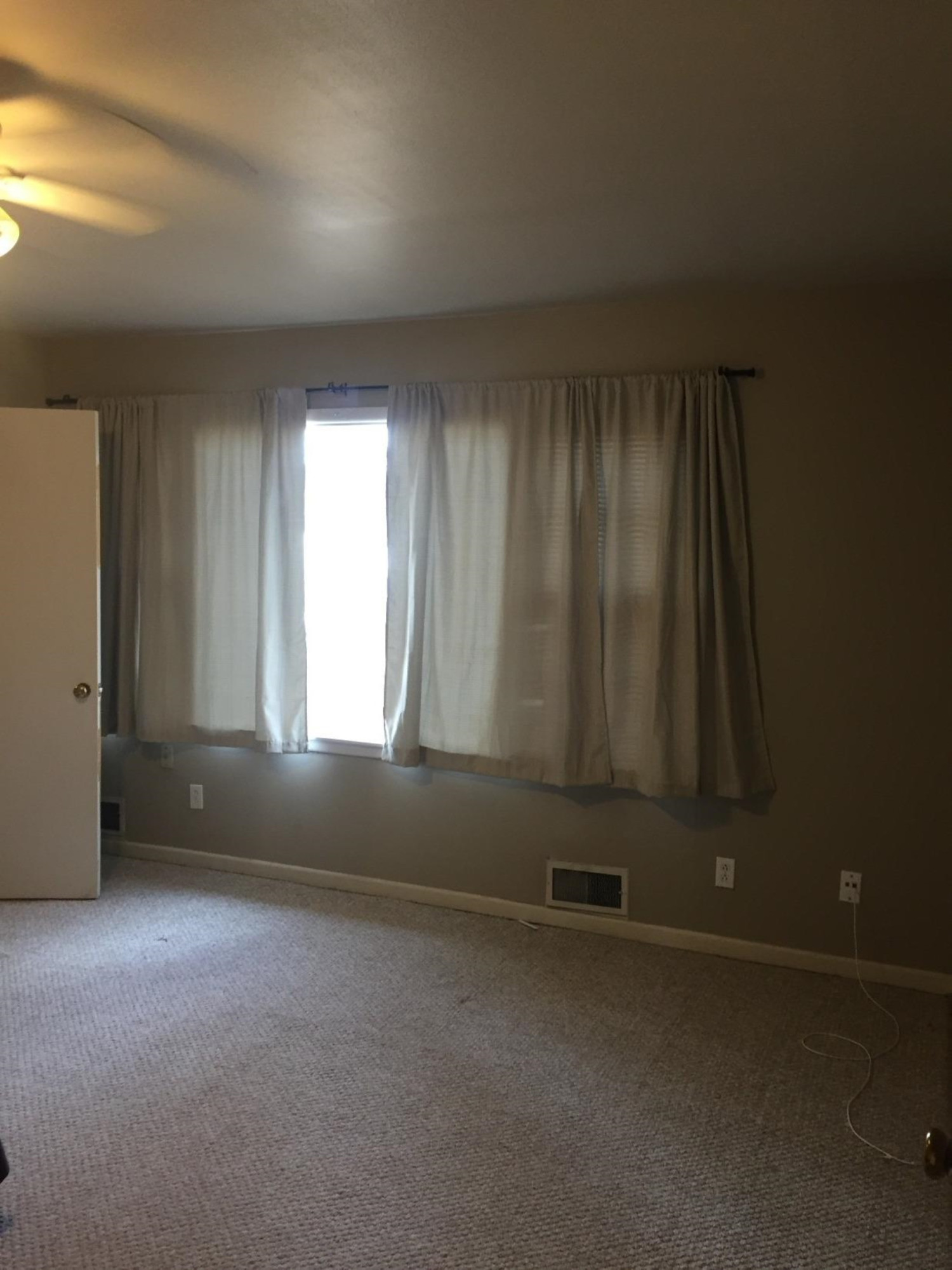 3216 36th Street Lubbock, TX 79413 - Photo 8 of 11 an empty room with windows