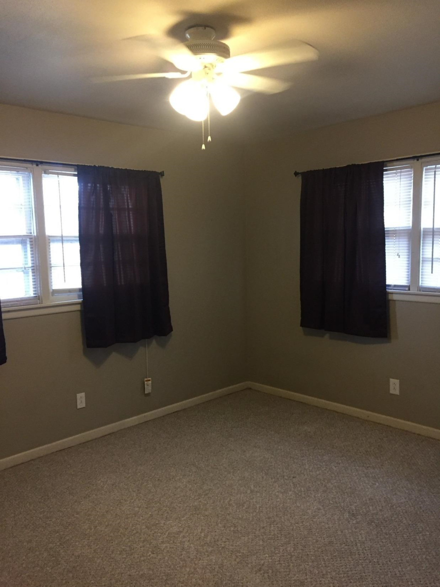 3216 36th Street Lubbock, TX 79413 - Photo 9 of 11 an empty room with a window