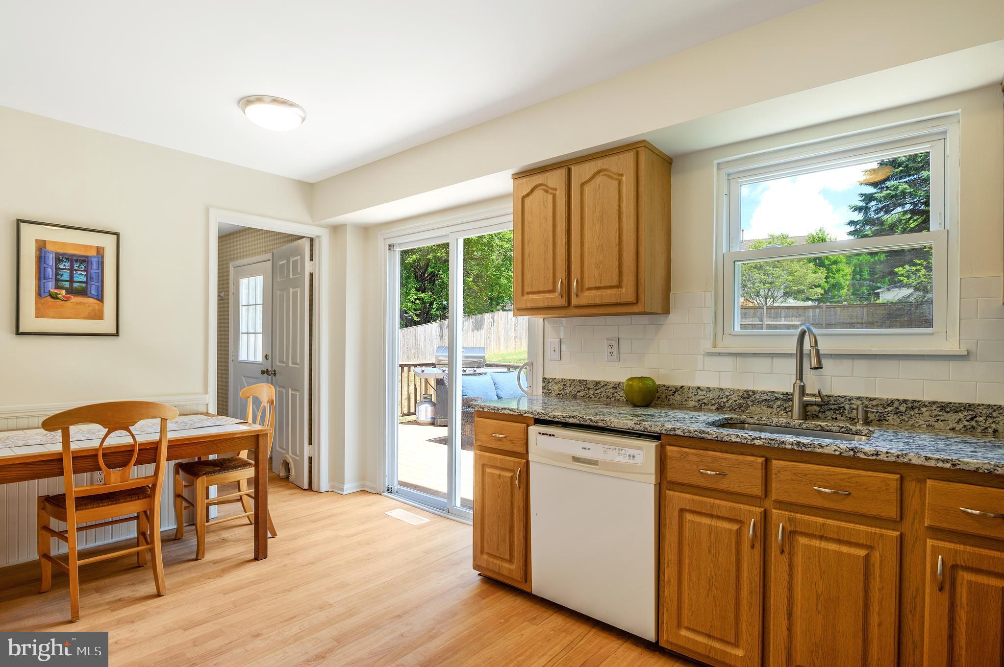 918 Pointer Ridge Drive Gaithersburg, MD 20878 - Photo 21 of 41 Kitchen with walk out to rear yard