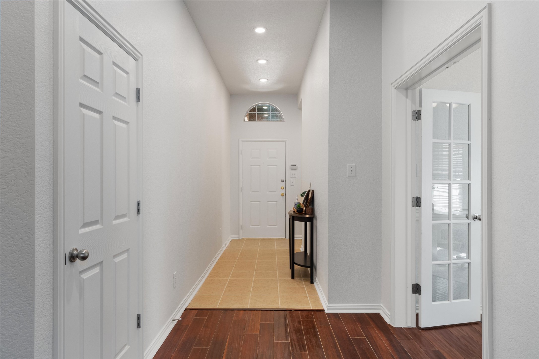 2801 Kickapoo Cavern Drive Pflugerville, TX 78660 - Photo 5 of 38 Corridor featuring wood tiled floors and recessed lighting