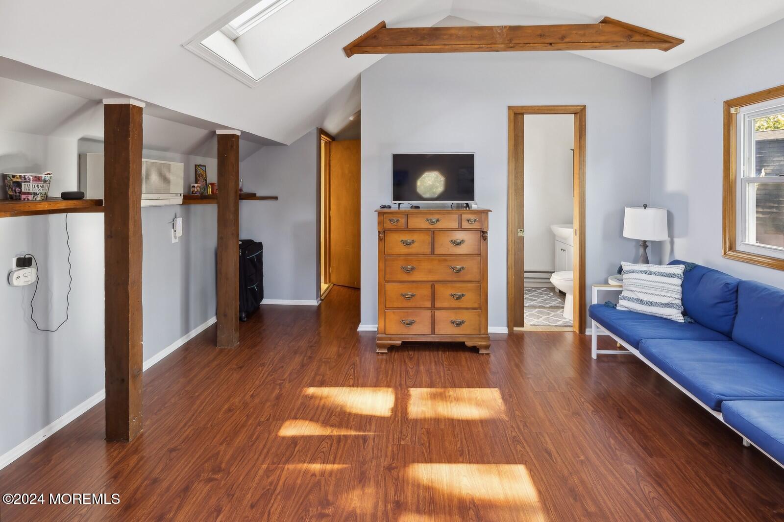 664 Carroll Fox Road Brick, NJ 08724 - Photo 42 of 63 a living room with furniture and a wooden floor