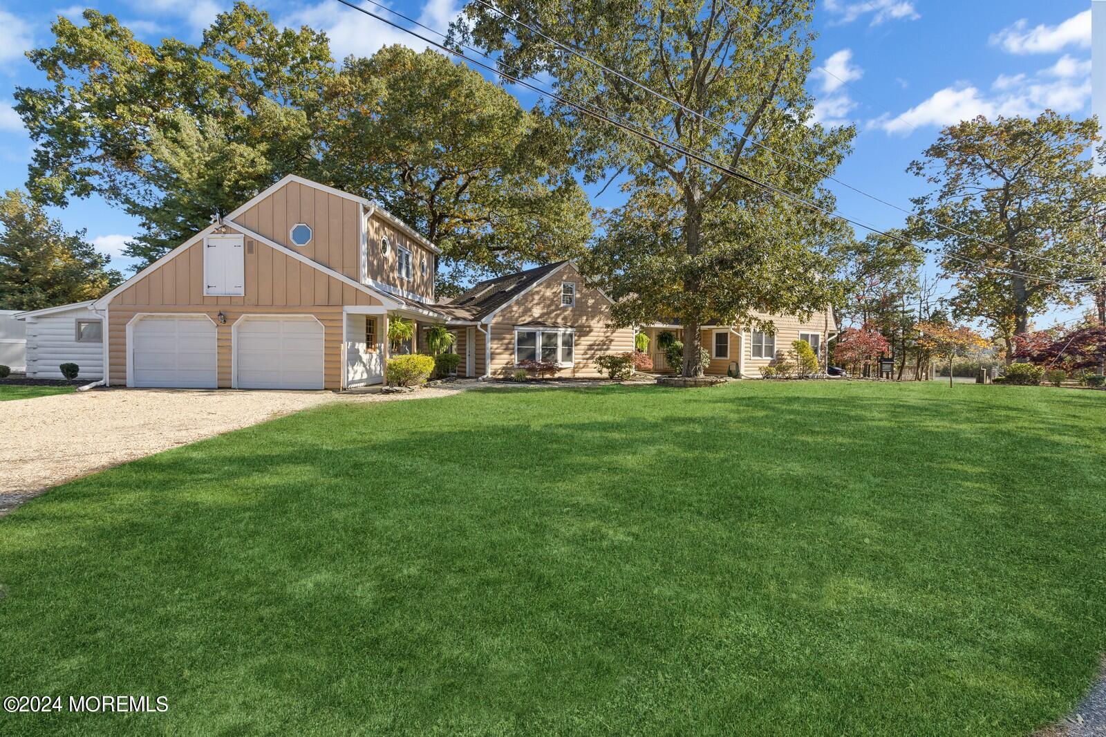 664 Carroll Fox Road Brick, NJ 08724 - Photo 54 of 63 a front view of house with a garden