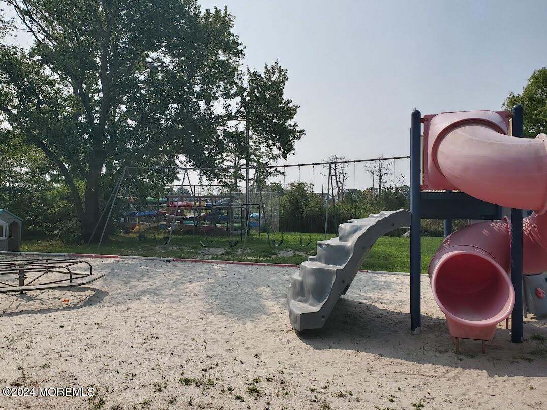 664 Carroll Fox Road Brick, NJ 08724 - Photo 61 of 63 a view of a slide with a slide